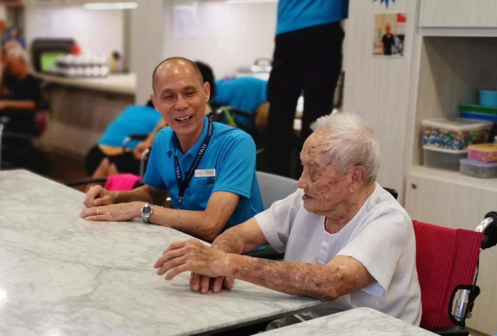 A Heart for Service: Francis chatting with elder at Nee Soon Central Centre