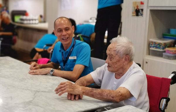 A Heart for Service: Francis chatting with elder at Nee Soon Central Centre