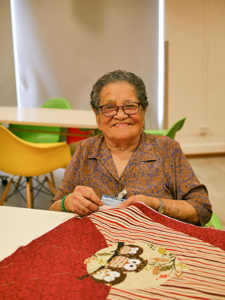 Mdm Lim sewing during the sewing club